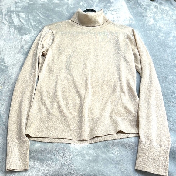 Turtleneck creamy colour with the sparkl - Picture 1 of 1